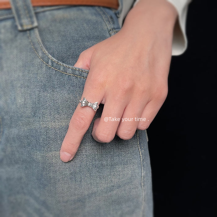 Open Adjustable Silver Tone Bow Ring With Twisted Beaded Band