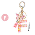 Glitter Resin Letter Keychain with Butterfly Charm and Tassel view 11