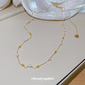 Delicate Gold Tone Necklace with Small Pastel Beads view 4