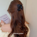 Black Satin Bow Hair Claw With Layered Loops And Knotted Center view 4
