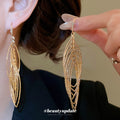 Nested Oval Wire Drop Hook Earrings In Gold And Silver view 4