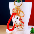 Jeweled Cow Keychains With Enamel Spots and Braided Wrist Straps view 1