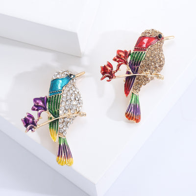 colorful hummingbird and flower brooch group view