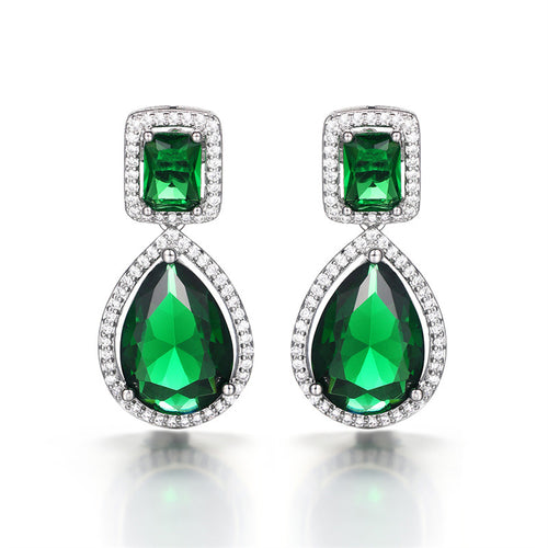 Front product shot of green halo drop earrings on white