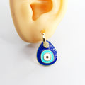 Gold Tone Blue Teardrop Evil Eye Huggie Drop Earrings view 2