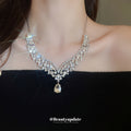 Silver Tone Floral Leaf V Crystal Necklace And Teardrop Earring Set view 2