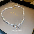 White Pearl Choker Necklace Crystal Pave Bow Center Gold Tone view 1