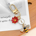 Gold Tone Initial Letter Charm Keychain with Enamel Daisy and Rhinestone Bee view 12