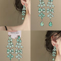 Green Leaf Crystal Chandelier Earrings in Large and Small Styles view 1