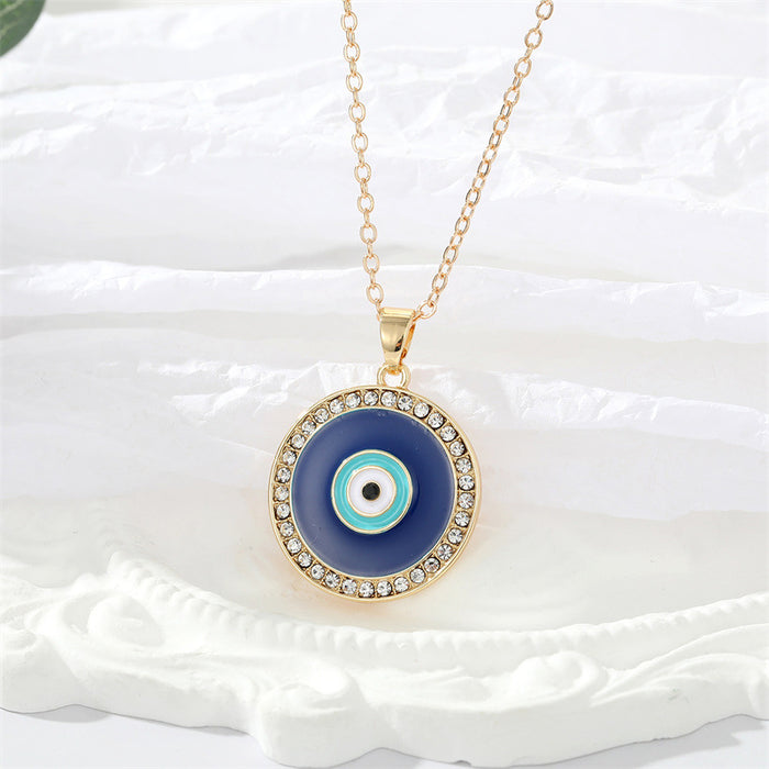Gold Tone Crystal Halo Blue Evil Eye Pendant Necklace
