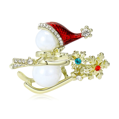 Pearl snowman sled brooch on white background
