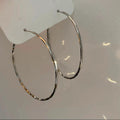 Large Slim Textured Hoop Earrings in Gold and Silver Tones view 7