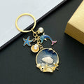 Blue Dolphin Starfish Shell and Faux Pearl Ocean Charm Keychain view 4