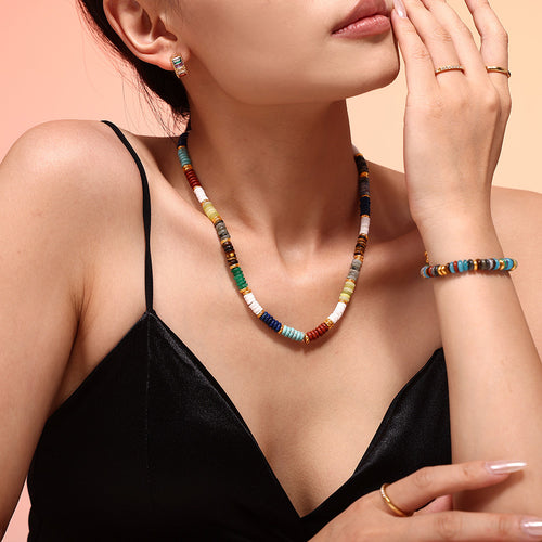 Multicolor disc bead necklace and bracelet worn together