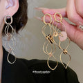 Open Circle Spiral Drop Earrings in Three Fastening Styles view 2
