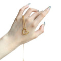 Twisted Open Heart Pendant Necklace on Fine Gold Tone Chain view 5