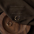 Matte Gold Twisted C Hoop Stud Earrings Open Metal Pair view 4