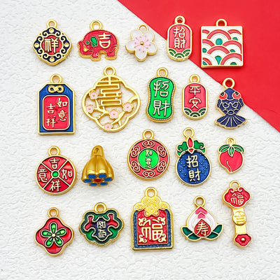 Colorful assorted shape charms arranged on a light background