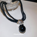 Black Multi Strand Beaded Necklace with Round Pendant view 2