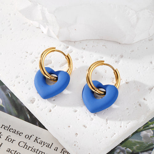 Close-up showing the colors and surface details of gold Tone Acrylic Heart Hoop Earrings in Six Colors