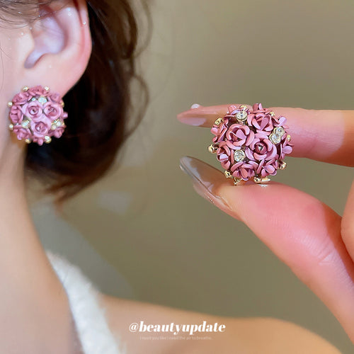 Pink Rose Cluster Stud earrings shown worn at the ear