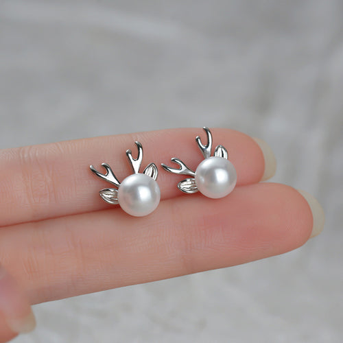 Image 2 showing pearl reindeer stud earrings