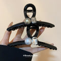 Twelve Mixed Hair Claw Designs With Pearls Flowers Stars And Bows view 3