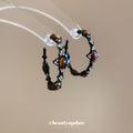Black Textured Hoop Earrings With Brown Oval Accents view 1