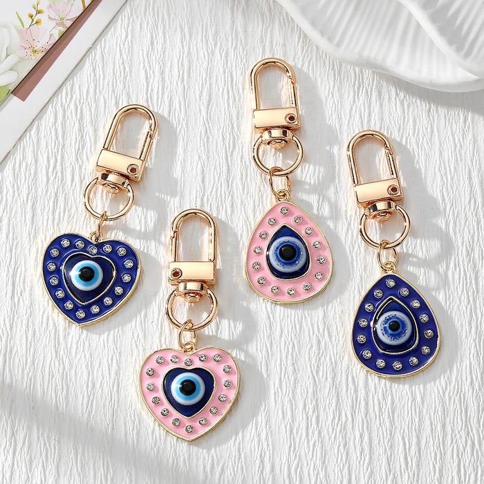 Gold Tone Rhinestone Evil Eye Heart and Teardrop Snap-Hook Keychains