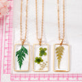 Gold Tone Rectangular Resin Pressed Flower Pendant Necklaces in Seven Designs view 5