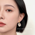 Asymmetric Gold Face Shell Drop Earrings Ball Studs view 2
