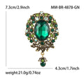 Antique Oval Crystal Dangle Brooch With Faceted Crystals And Polished Metal Details view 7