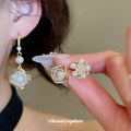 Gold Tone Flower And Pearl Earrings In Three Styles view 2
