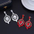 Red Silver Tone Teardrop Crystal Sunburst Crystal Two Designs Metal Dangle Earrings view 4