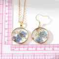 Round Pressed Blue Flower Resin Necklace and Earring Options view 5