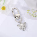 Gold and Silver Tone Assorted Symbol and Character Clip Keychains view 11