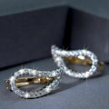 Two-Tone Twisted Teardrop Huggie Earrings with Clear Stone Details view 2