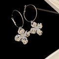 Crinkled Metal Flower Charm Hoop Earrings in Gold and Silver view 7