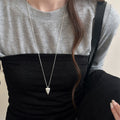 Pointed Heart Pendant Necklace in Gold and Silver Tones view 1