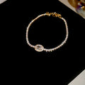 Oval Crystal Center Tennis Bracelet In Gold Or Silver Tone view 6