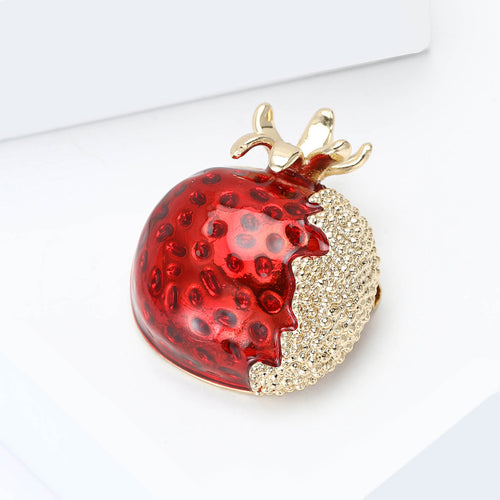 Red Pomegranate Brooch shown alone on a light background