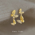 Gold Dual Butterfly Drop Earrings Crystal Pavé Wings view 3