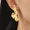 Hammered Three-Petal Flower Stud Earrings Shell Bead Center view 2
