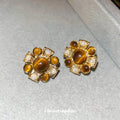 Gold Tone Brown Cabochon Floral Stud Earrings With Decorative Metal Accents view 2