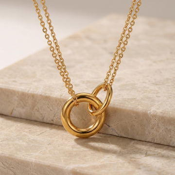 Round Geometric Pendant Necklace in Gold and Mixed Metal Tones
