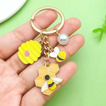Bee and Honeycomb Charm Keychains Featuring Yellow Sunflower Across 33 Pictured Variations
