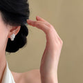 Crystal Flower Basket Stud Earrings in Silver and Gold view 4