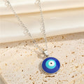 Round Blue Evil Eye Pendant Necklaces and Earrings in Two Finishes view 8
