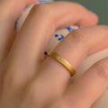 Matte Gold Tone Closed Band Ring With Tiny Starburst Crystal view 4