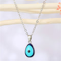 Gold Tone Shaped Evil Eye Pendant Necklaces in Four Designs view 7